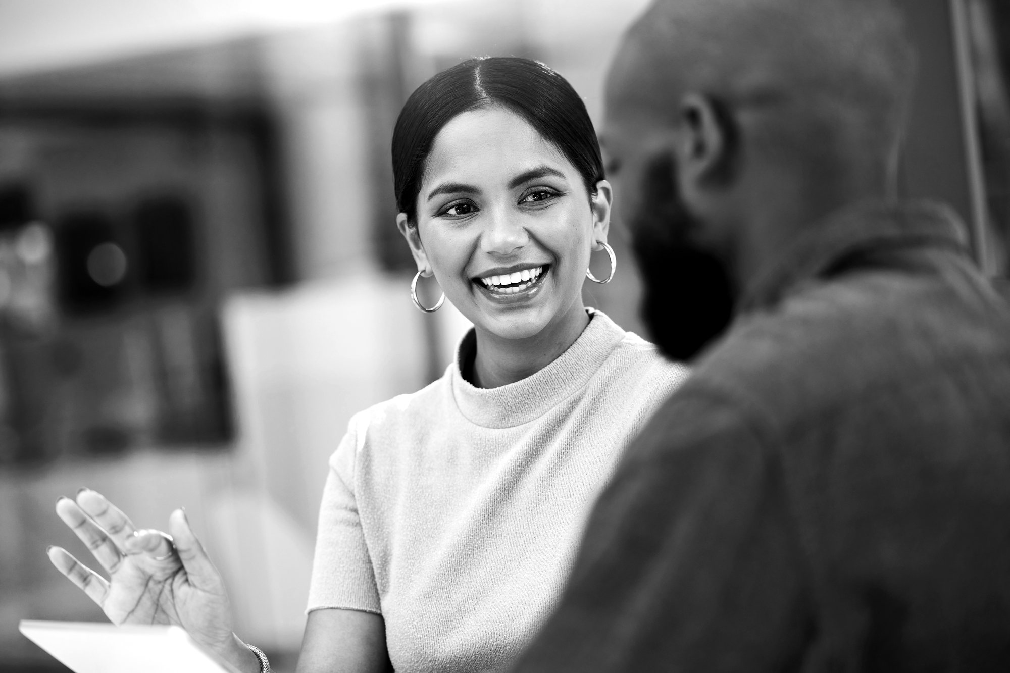 A Fortis advisor in conversation with a colleague